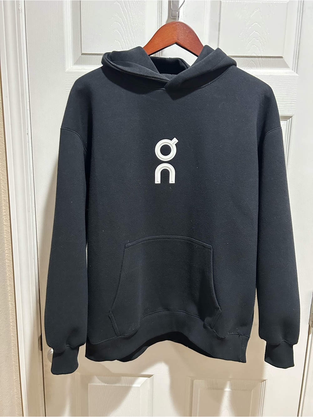 On Running Black Hoodie with White Logo - Men's Pullover